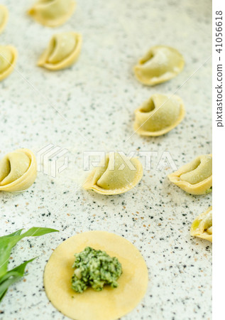 Making tortellini Making tortellini 41056618