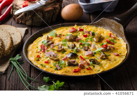 Fresh omelette, pickles mushrooms and chilli 41056671