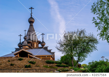 beautiful old wooden Church on a hill at dawn 41057564