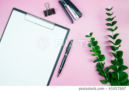 Women's stylish table. Workspace with blank white paper free spa Women's stylish table. Workspace with blank white paper free spa 41057897