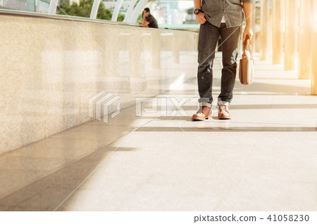 Man walking in city. Man walking in city. 41058230