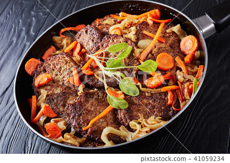 Chicken liver pancakes in a skillet Chicken liver pancakes in a skillet 41059234