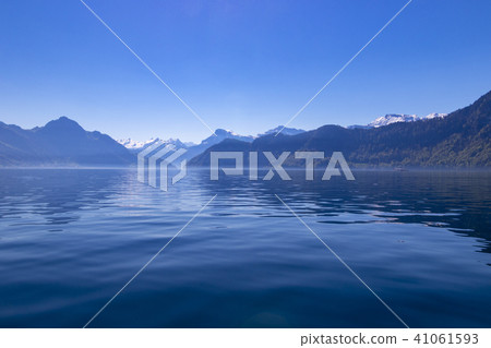 Blue sky and Alps seen from Lake Lucerne in Switzerland Blue sky and Alps seen from Lake Lucerne in Switzerland 41061593