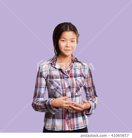 Asian girl shows well done with both hands Asian girl shows well done with both hands 41065657