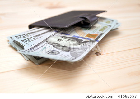 Heap of money and wallet. Money concept Heap of money and wallet. Money concept 41066558