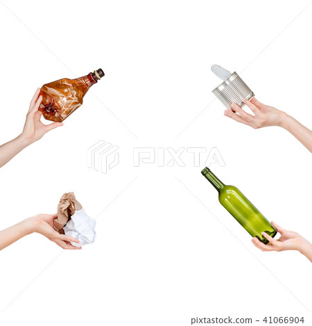 Hands holding crumpled paper, empty glass and plastic bottles, tin can isolated on white background Hands holding crumpled paper, empty glass and plastic bottles, tin can isolated on white background 41066904