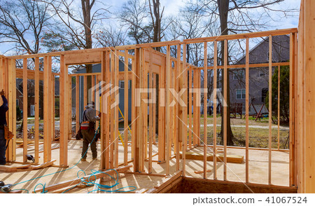 Interior framing of a new house under construction Interior framing of a new house under construction 41067524