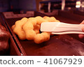 Close-up of doughnut in display at supermarket 41067929