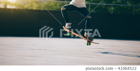 Skateboarder skateboarding at city Skateboarder skateboarding at city 41068522