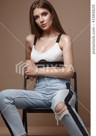 sexy fashion model with long hair, beautiful eyes, full lips, perfect skin is posing in studio for sexy fashion model with long hair, beautiful eyes, full lips, perfect skin is posing in studio for 41068826