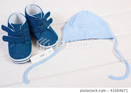 Pregnancy test with positive result and clothing Pregnancy test with positive result and clothing 41069671