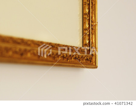 corner of a golden frame 41071342