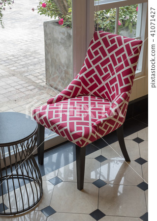 Red chair and coffee table Red chair and coffee table 41071427