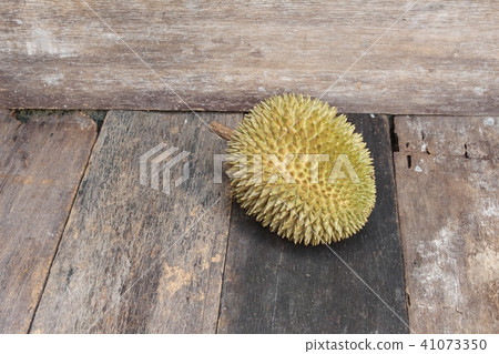 durian fruit which has thorn on wood background 41073350