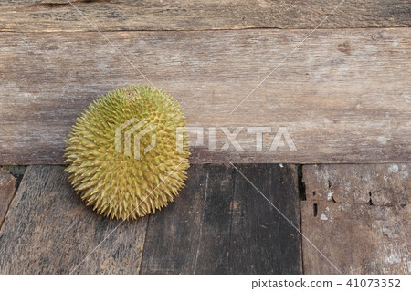 durian fruit which has thorn on wood background 41073352