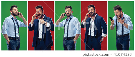 Photos of elegant man using smartphone with various emotions. 41074183