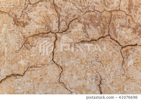 Brown adobe clay wall texture background. 41076696