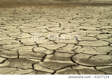 desert soil with cracks pattern on dry clay.. 41077128