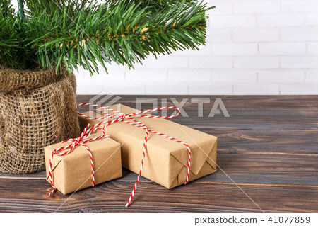 New Year's gifts wrapped in wrapping paper New Year's gifts wrapped in wrapping paper 41077859