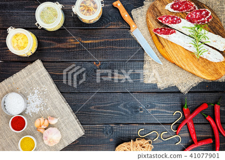 Sliced cured sausage with spices Sliced cured sausage with spices 41077901