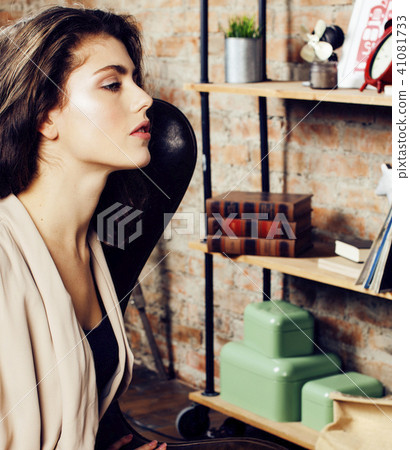 young pretty woman waiting alone in modern loft studio, fashion young pretty woman waiting alone in modern loft studio, fashion 41081733