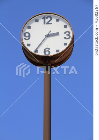 Clock in the playground with blue sky back 41082267