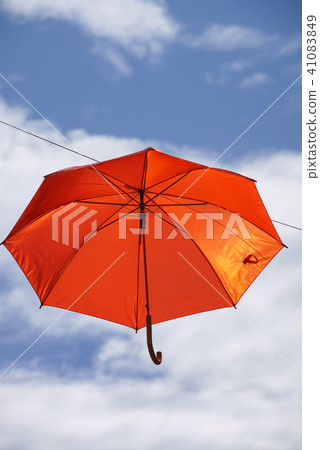 umbrella flying on a blue sky 41083849