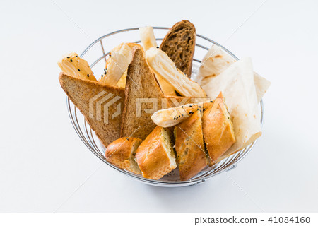 Basket with different kinds of fresh bread 41084160