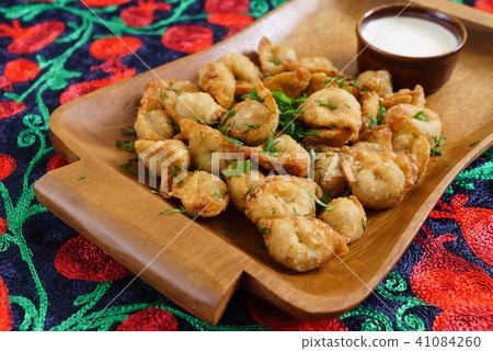 fried dumplings with sour cream fried dumplings with sour cream 41084260