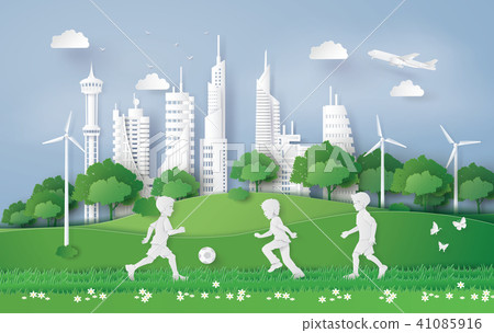 boy plaing football in the city park boy plaing football in the city park 41085916