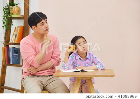 My daughter studying with my dad at the weekend 41085969