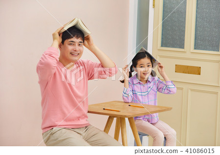 My daughter studying with my dad at the weekend My daughter studying with my dad at the weekend 41086015