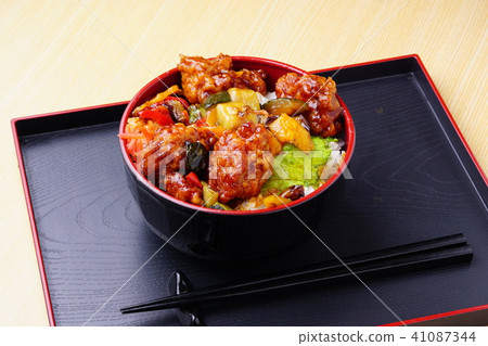 Deep fried chicken with black vinegar on rice Deep fried chicken with black vinegar on rice 41087344