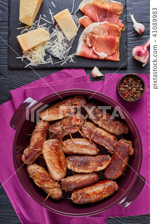 beef steak rolls in a dish 41089983