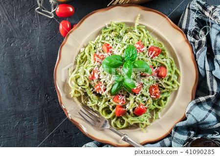 Vegetarian pasta spaghetti with basil pesto 41090285