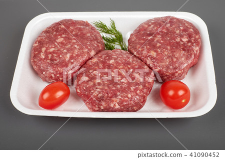 beef burgers in plastic package isolated on white background 41090452