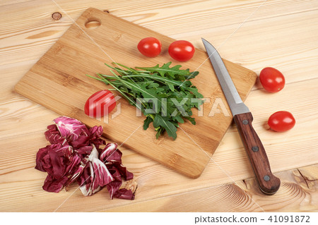 Vegetable and salad set for a healthy dietary lifestyle on a cutting board Vegetable and salad set for a healthy dietary lifestyle on a cutting board 41091872