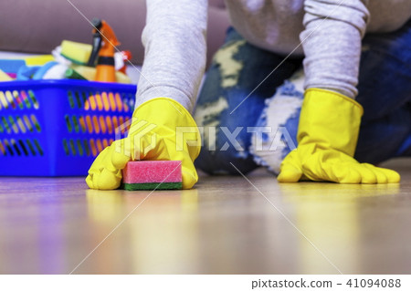Woman cleaning floor Woman cleaning floor 41094088