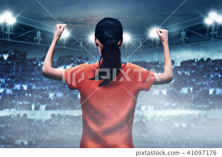 Soccer player woman with happy expression Soccer player woman with happy expression 41097176