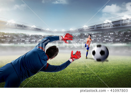 stock photo: footballer trying to catch the ball