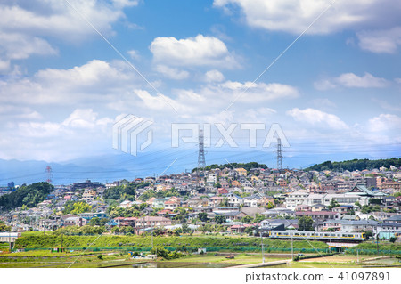 Local line running in a suburban residential area Local line running in a suburban residential area 41097891