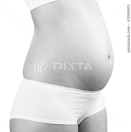 Pregnant woman presents belly. Maternity concept. 41098001