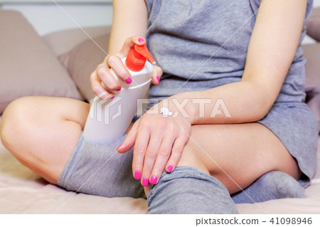 Cream on woman hand 41098946