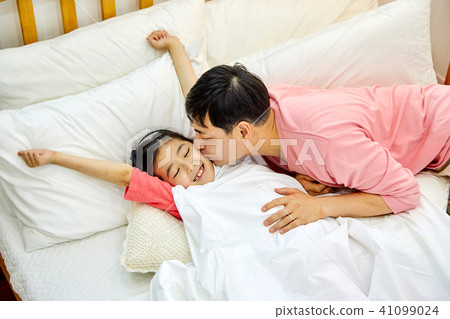 Dad wakes up sleeping in bed Dad wakes up sleeping in bed 41099024