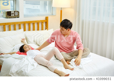 Dad wakes up sleeping in bed Dad wakes up sleeping in bed 41099031