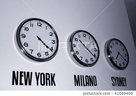 Clock on the wall showing time in the world Clock on the wall showing time in the world 41099409