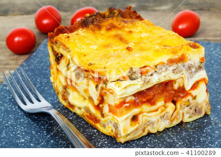 Frozen lasagna on table Frozen lasagna on table 41100289