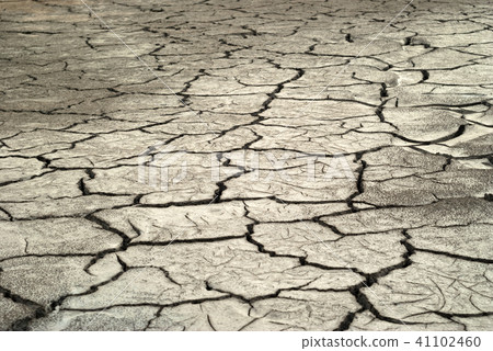 desert soil with cracks pattern on dry clay.. desert soil with cracks pattern on dry clay.. 41102460