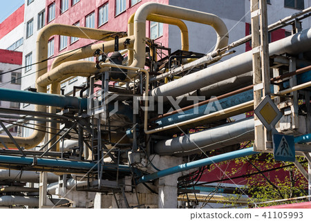Industrial pipes outside building Industrial pipes outside building 41105993