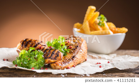 Grill chicken breast salt pepper parsley and herbs Grill chicken breast salt pepper parsley and herbs 41115281